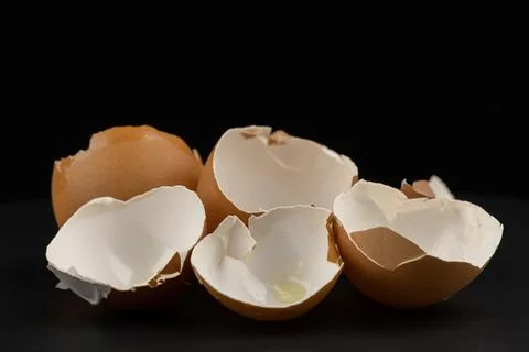 Broken of egg shell group crack  isolated on black background Stock-Fotos