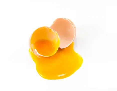 Broken egg on white background Stock Photos
