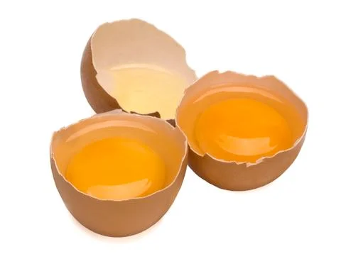 Broken eggs isolated on white background Stock Photos