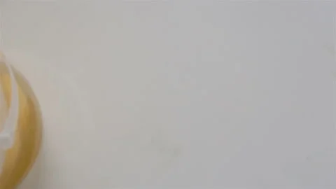 Broken eggs in a plastic bucket close-up. A female hand moves the container into Stock Footage 142241553