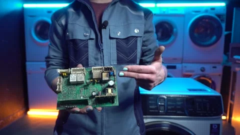 A broken electronic board from a washing machine Stock Footage 169606486