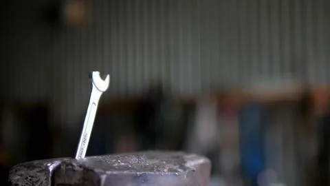 Broken end wrench in vice in old garage Stock Footage 195982007