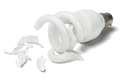 Broken Energy Saving Light Bulb Stock Photos