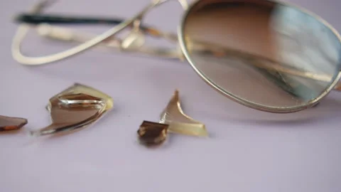 broken eye glass on table with copy Stock Video Pond5