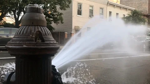 Broken fire hydrant water gushing street summer 4K and 1080 HD Stock Footage 95276293