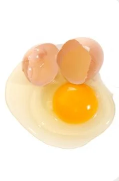 Broken free range egg on white background Stock Photos