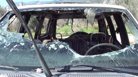 Broken front window of a blasted car Video stock 47403343