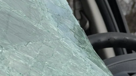 Broken front windshield glass at accident 4k Stock Footage 332955651