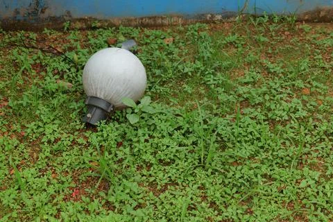Broken garden light Stock Photos
