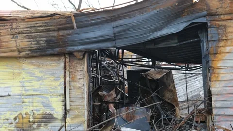 Broken gas station from shells and mines, destroyed by the war in Ukraine Stock Footage 254207192