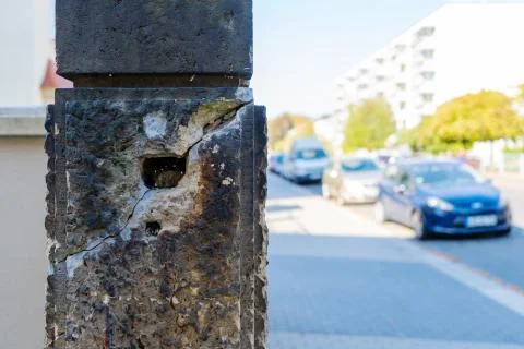 A broken gate post made out of sandstone Stock Photos