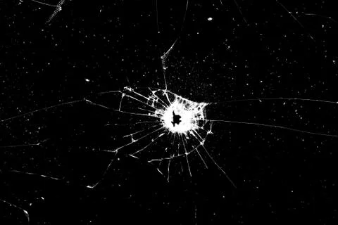 Broken glass on a black background. white cracks Stock Photos