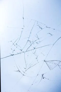 Broken glass on blue background, object background design texture Stock Photos