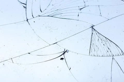 Broken glass on blue background, object background design texture Stock Photos