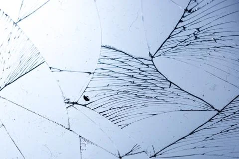 Broken glass on blue background, object background design texture Stock Photos