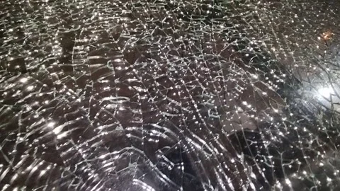 Broken glass. Camera movement across the broken glass. Stock-Footage 304130740