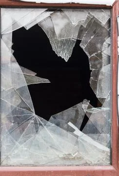 Broken glass in the close-up window Stock Photos