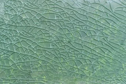 Broken glass in cobweb Stock Photos