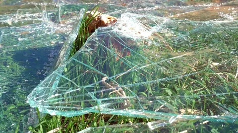 Broken glass that fell down on stone Stock Footage 71138139