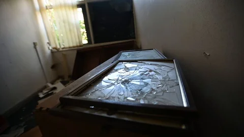 Broken Glass Frame In An Old Abandoned Building Video stock 113814960