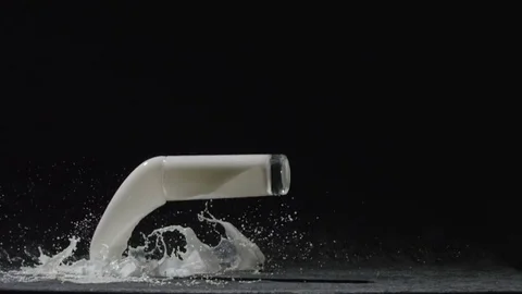 Broken glass with milk Stock Footage 78993043