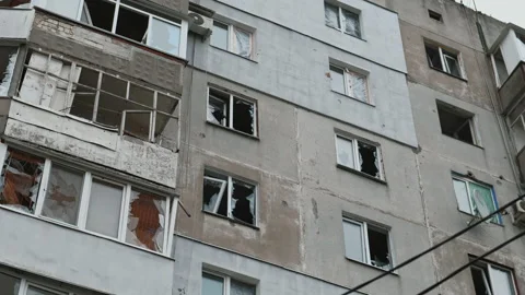 Broken glass of a multi-storey building due to a Russian shell Stock Footage 200918251