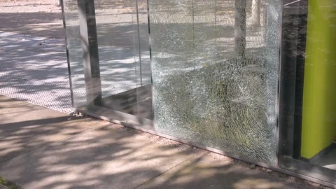 Broken glass store front wall panel Stock Footage 163650995