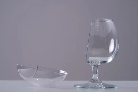 Broken glass on table Stock Photos