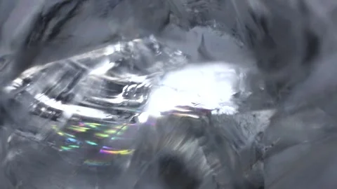 Broken glass texture with colourful light flares. Changing light. Optical Stock Footage 294316672