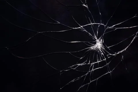 Broken glass texture with cracks. Stock Photos