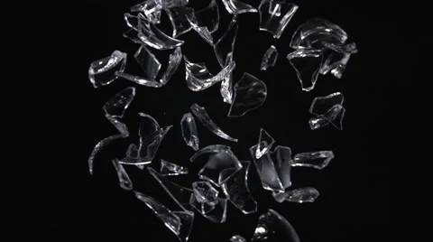 Broken glasses exploding against black background. Slow Motion. 動画素材 55535470