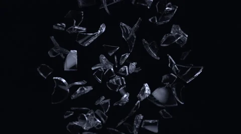 Broken glasses exploding against black background. Slow Motion. Stock Footage 55535594