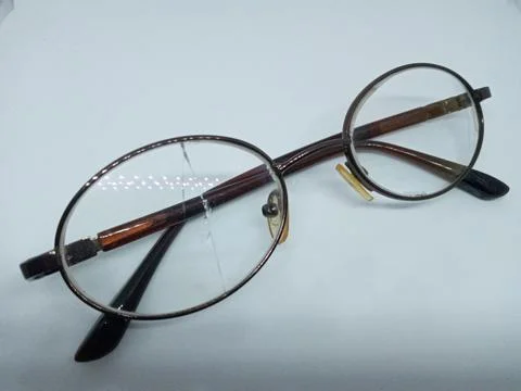 Broken glasses isolated on white background. Stock Photos