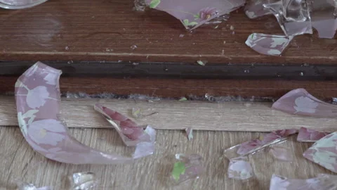 Broken glassful on the floor Stock Footage 241654725