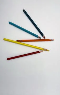 Broken graphite pencil on white background. School stationery Stock Photos