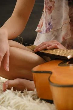 Broken guitar strings Foto stock