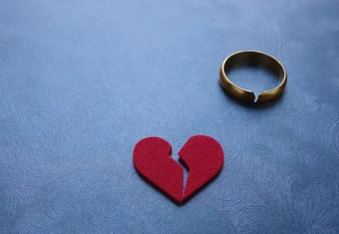 Broken heart and ring Stock Photos