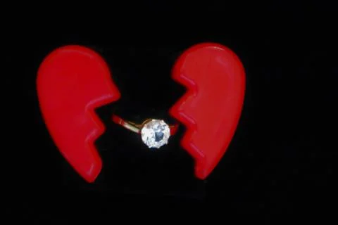 Broken heart and a  ring Stock Photos