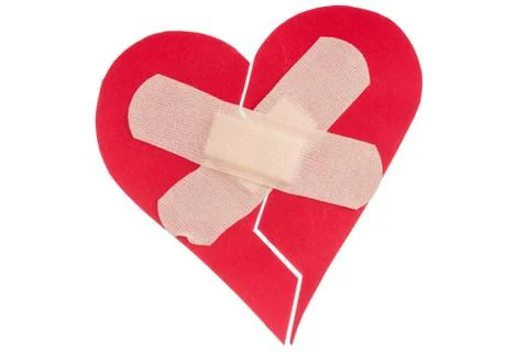 Broken heart with plaster Stock Photos