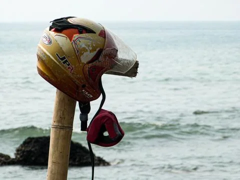 Broken Helmet at a Beach Stock Photos