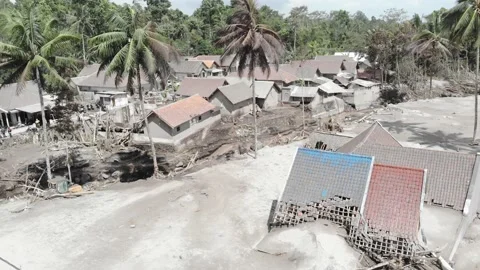 BROKEN HOUSE BECAUSE OF COLD LAVA IN RENTENG VILLAGE, LUMAJANG. Stock Footage 166811796