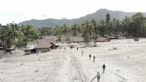 BROKEN HOUSE BECAUSE OF COLD LAVA IN RENTENG VILLAGE, LUMAJANG. Stock Footage 166813125