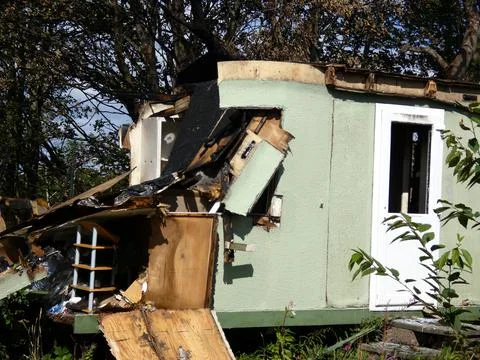 Broken house with garbage and windows, doors Stock Photos