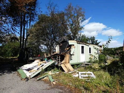 Broken house with garbage Stock Photos