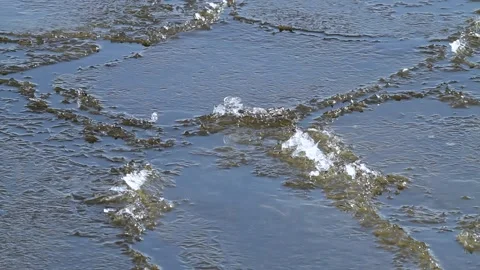 Broken ice collides on the waves Stock Footage 150860783