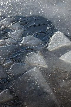 Broken ice on a lake in winter Foto stock