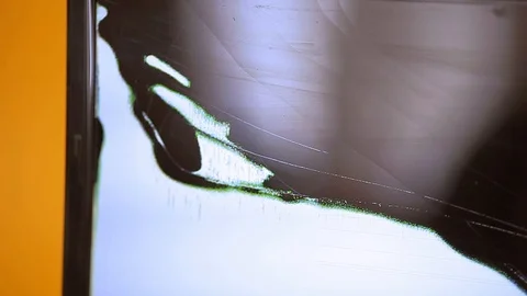 A broken laptop screen on a colorful background Stock-Footage 103537146