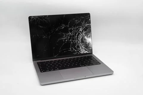 Broken LCD display on laptop computer. Isolated white background. Foto stock