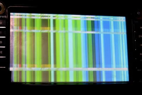 Broken LCD screen with multiple colors and pixelations with color errors 写真素材