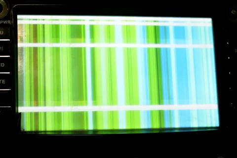 Broken LCD screen with multiple colors and pixelations with color errors 写真素材